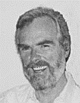 black and white photograph of Roger Nelson smiling
